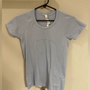 Lulu Lemon Size 8 Light Blue Shirt